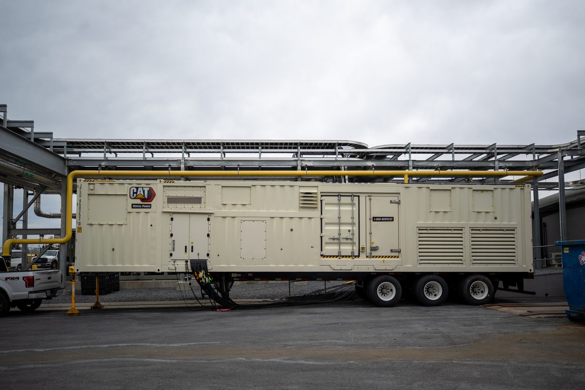 CAT generator with custom enclosure at data center site