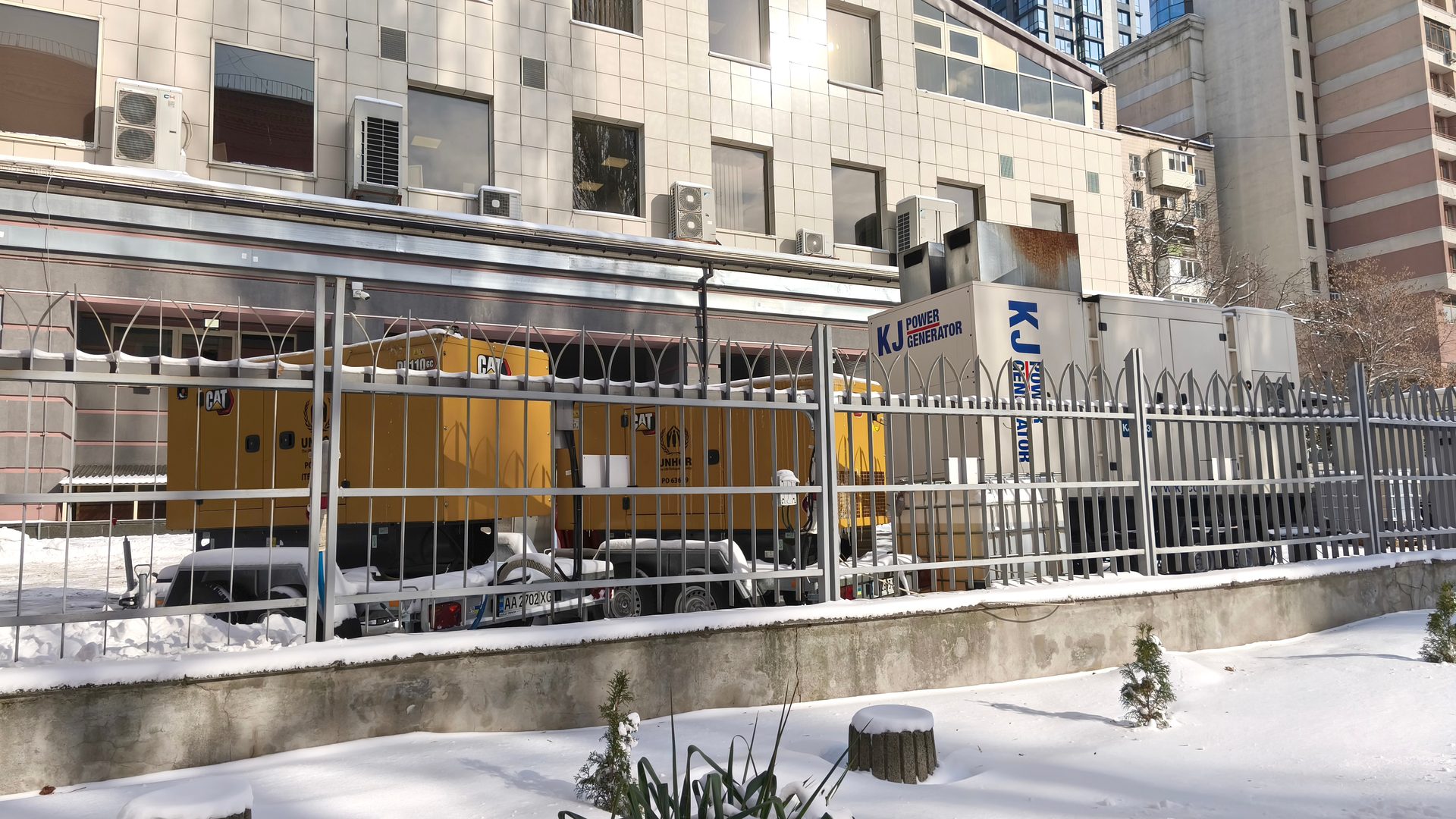 CAT yellow generator sets on a job site